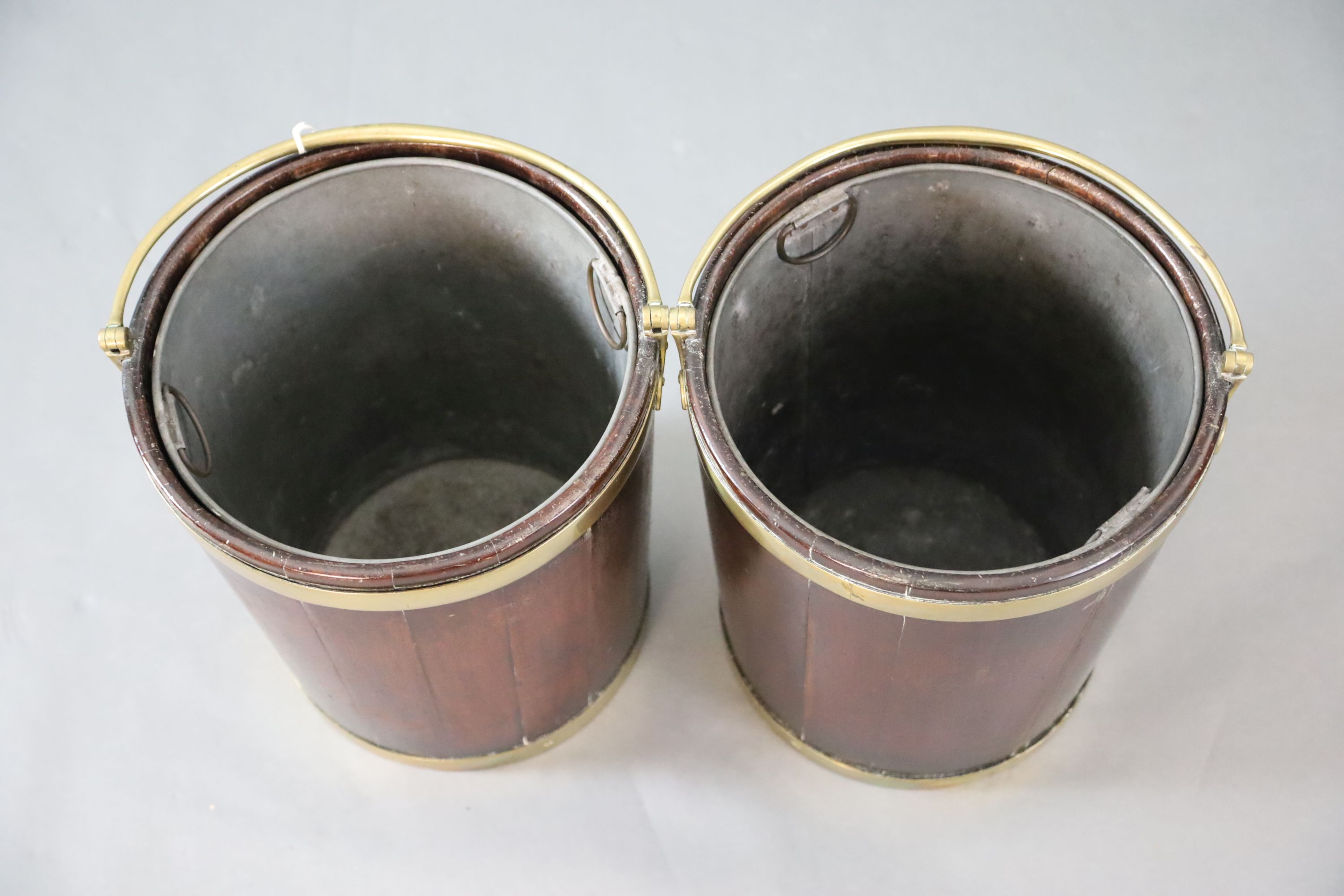 A pair of George III brass bound mahogany peat buckets, W.1ft 3in. H.1ft 5in.